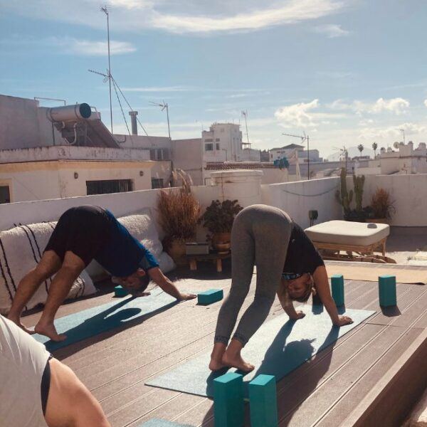 Rooftop yoga flow connecting into the nature in Tarifa