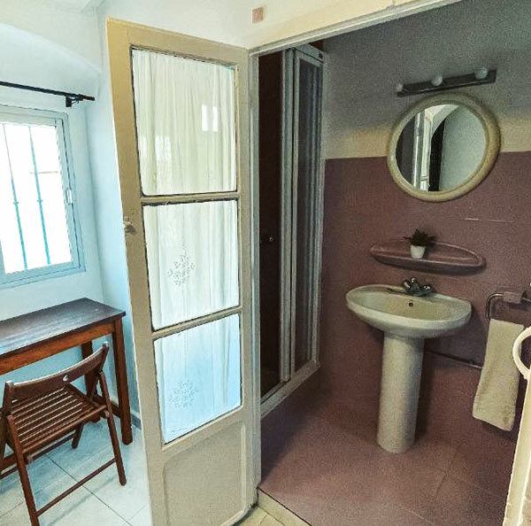 baño privado Habitaciones hostal Africa