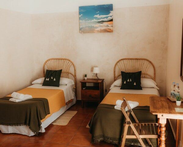 Superior Twin room with a desk and a private bathroom in Hostel Africa center town of Tarifa
